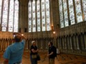 June talks to Ehren in the chapter house as Livingston takes a picture